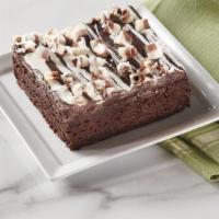 Chocolate Brownie  · Fudgy chocolate chips brownie served with whipped cream.