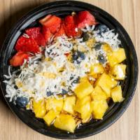 Acai Charge Bowl · Acai topped with organic granola, pineapples, strawberries, blueberries, coconut flakes and ...