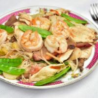 Cantonese Style Rice Noodle · Pan fried noodles with roast pork, chicken, shrimp and Chinese mixed vegetables.