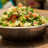 Tabbouleh Salad · Vegan. Ground bulgur wheat, cucumber, tomato, parsley, lemon, olive oil.