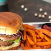 Beyond Burger · Vegan. Beyond meat patty, vegan mayo, lettuce, tomato, pickles,red onon, side of tahini sauce.