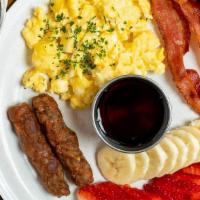 Bulegreen Waffle · Our perfect homemade golden brown Belgian Waffle served with side of scrambled eggs, bacon, ...