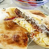 Breakfast Pillow · Scrambled eggs, sausage, bacon, cheese, spread creamy mayonnaise wrapped inside organic tort...