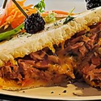 Smoked Brisket · This Special house hot sandwich is made in your choice of bread, filled with Smoked Brisket ...