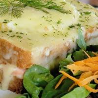 Croque Salmon · Our version of this classic French dish is made of two slices of bread dipped on homemade bé...