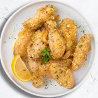 Poultry Parm Wings · Fresh chicken wings fried until golden brown, and tossed in garlic and parmesan.
