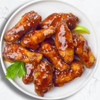 Bbq Party Wings · Fresh chicken wings fried until golden brown, and tossed in barbecue sauce.