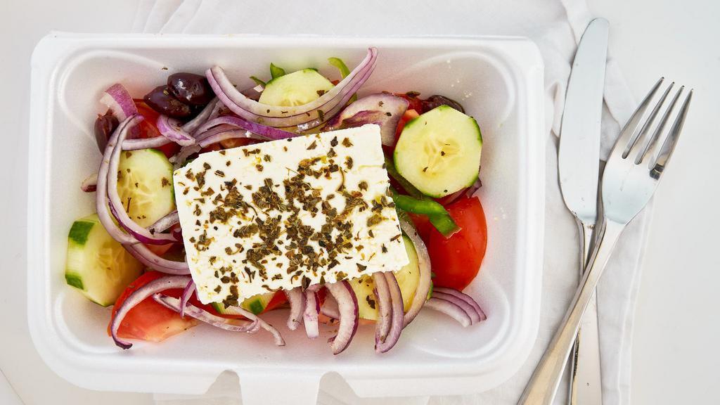 Greek Salad · Most popular. Tomatoes, cucumbers, green peppers, onions, Feta, extra virgin olive oil, oregano and pepperoncini.