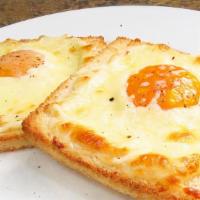Toastada Y Queso · Toasted cuban bread with cheese.