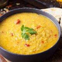 Daal Tarka · Yellow lintels (masoor daal) cooked with tomatoes, onions, and spices. Served with  1 side d...