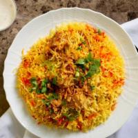 Chicken Boneless Biryani · Boneless chicken meat marinated with exotic spices cooked with basmati rice. It is served wi...