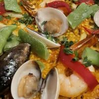 Paella De Mar / Sea Paella · Calamares, camarones, almejas, mejillones y vegetales. / Calamari, shrimps, clams, mussels a...