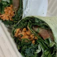 Veggie Wrap · Hummus, spinach, mixed greens, tomatoes, cucumbers & carrots