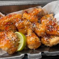 Boneless Wings (Cauliflower Florets) · Eight cauliflower florets battered, fried, and tossed in a sauce of choice.