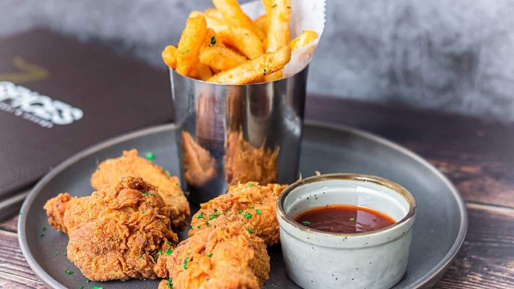 Chicken Wings & Fries · 4 jumbo fried chicken wings. Served with sweet & sower spicy sauce and a side of french fries.