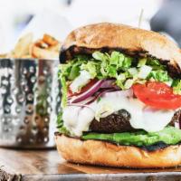 Veggie Falafel Burger · Homemade falafel patty, provolone cheese, avocado, arugula, red onion, tomato and honey must...