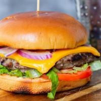 Cheeseburger · Cheese, tomato, onion, ketchup, Angus beef. Served with choice of French fried or Sweet pota...