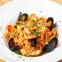 Seafood Pasta · Calamari, shrimps, clams, and mussels homemade spaghetti pasta in a classic Italian tomato s...