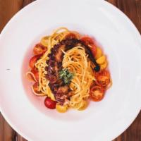 Spaghetti And Octopus · Spanish octopus, homemade spaghetti pasta in a classic Italian tomato sauce with cherry toma...