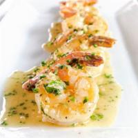 Garlic Butter Shrimps · Sauteed shrimps, cilantro, garlic and lemon sauce