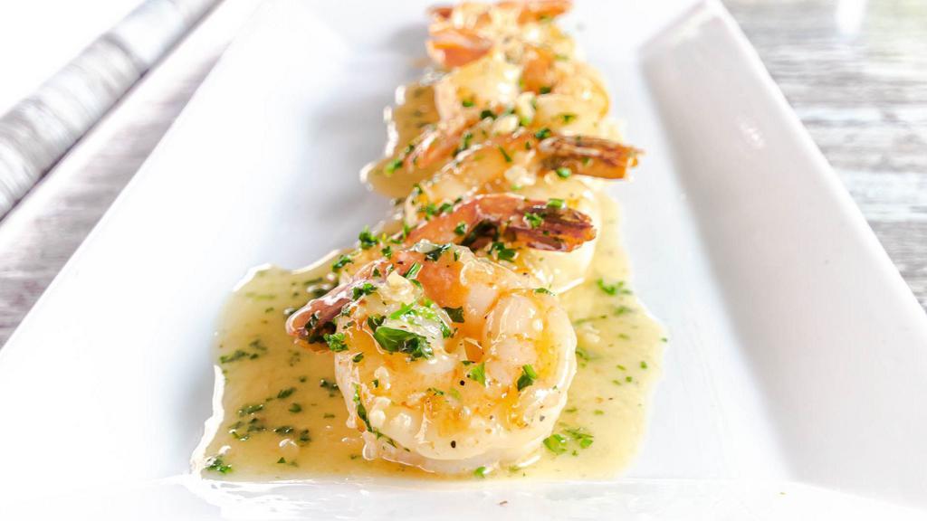 Garlic Butter Shrimps · Sauteed shrimps, cilantro, garlic and lemon sauce