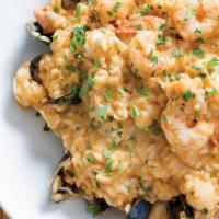 Seafood Risotto · Shrimp, mussels, clams, and fresh marinara sauce
