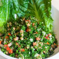 Tabbouleh · Vegan. Finely chopped parsley, onions, tomato, burghul wheat, dressed with olive oil and fre...