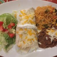 Burrito · A 10 inch flour tortilla with a spread of bean and stuffed with your choice of ground beef, ...