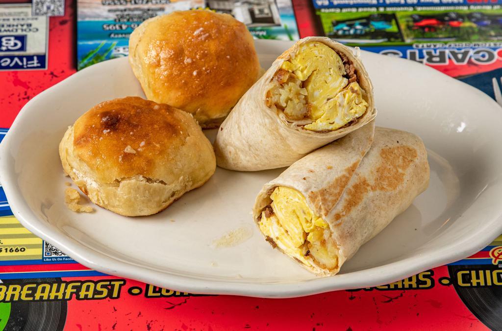 Steak Bomb Burrito · Three scrambled eggs, shaved steak, cheese, onions and tater tots all wrapped in a jumbo flour tortilla.