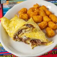Philly Steak Omelette · Three eggs, steak, cheese and grilled onions.