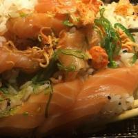 Sake Don · Fresh salmon sashimi over seasoned rice.
 Consuming raw or undercooked meats, poultry seafoo...