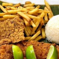 Chuleta Calena · Breaded pork chop with rice, salad and one more side.