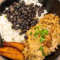 Lechon Asado · Slow Cuban roasted pork packed with delicious flavors thanks to our signature citrus and gar...
