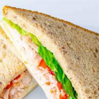 Turkey & Provolone · Turkey and provolone cheese on 15 grain wheat bread with mayo, lettuce and tomato.