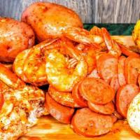 S3. · 1/2 lb shrimp (no head), 1 cluster snow crab, 1/2 lb sausages, one corn, two potatoes, and o...