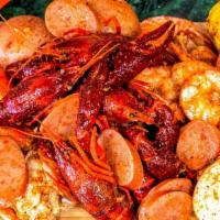 S2. · 1/2 lb crawfish, 1/2 lb shrimp (no head), 1 cluster snow crab, 1/2 lb sausages, one corn, tw...