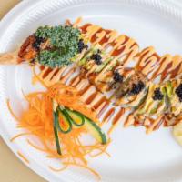 Black Dragon Roll · Smoked eel over shrimp tempura roll with eel sauce.