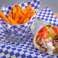 Gyro Pita · Gyro (lamb & beef cooked on a rotisserie) on pita bread with lettuce, tomatoes, red onion & ...
