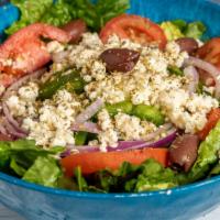 Sm Greek Salad · Tomatoes, cucumbers, red onion, green bell peppers, Kalamata olives & feta over romaine. Ser...