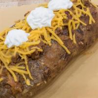 Chili Spud · Chili, Cheddar cheese, and sour cream.