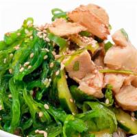 Sesame Chicken · All natural chicken breast, cucumber, sweet cilantro, sesame sauce, seaweed salad, green oni...