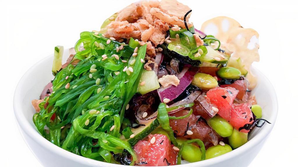 Build Your Own Poke Bowl · choose your proteins, mix-ins, toppings and flavor on top of choice of rice.