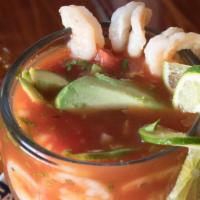 Cocktail De Camaron · Boiled shrimp, served with a cocktail sauce containing tomatoes, cilantro, onions, and avoca...