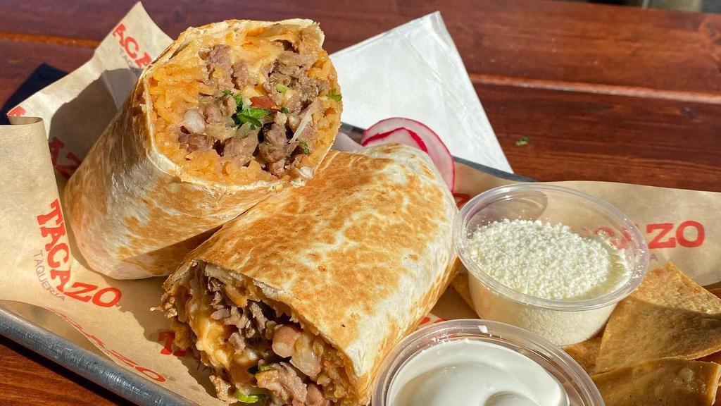 Burritos · Large Flour tortilla filled with beans, rice, your choice of meat, served with lettuce, cream, and cheese.