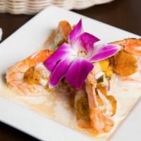 Crab Stuffed Shrimp · With mango salsa.