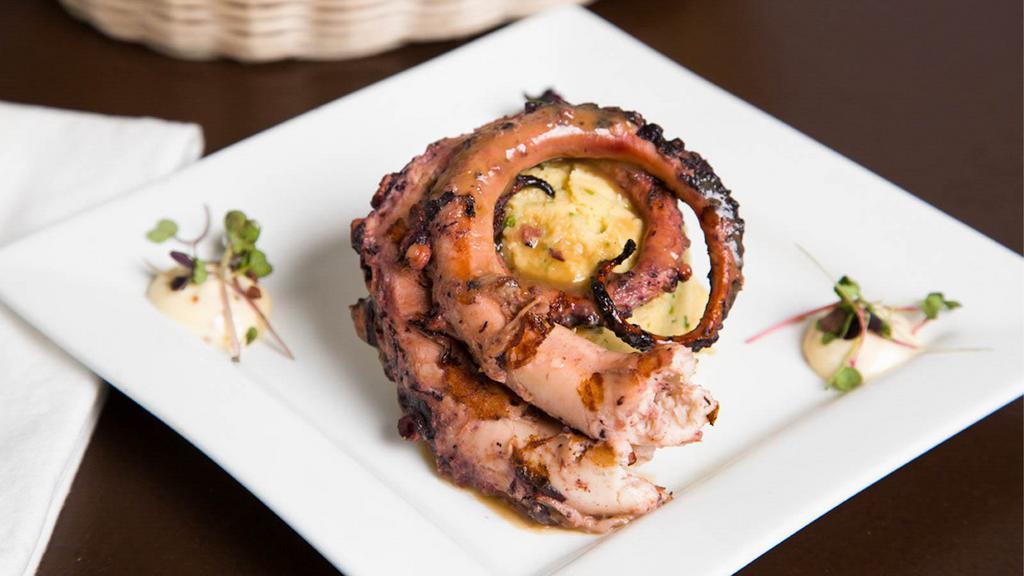 Grilled Octopus · Fresh grilled octopus served with hummus.