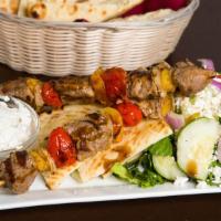 Plaka Souvlaki Platters · Kabob plate served with pita, tzatziki and small Greek salad.