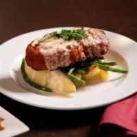 Yiayia’S Chicken · Lightly breaded chicken breast stuffed with spinach and cheese, served with lemon potatoes a...