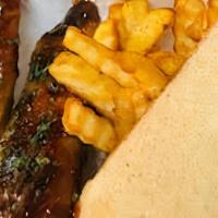 Turkey Rib Basket · 2 grilled ribs BBQ or jerk. Try mixed for an awesome event your taste buds must attend.