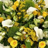 Yellow & White · This floral arrangement will bring sunshine, joy and brighten that special day.